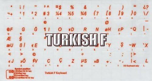מדבקות מקלדת טורקית עם כיתוב כתום על רקע שקוף ברור לשולחן עבודה, מחשב נייד ומחברת